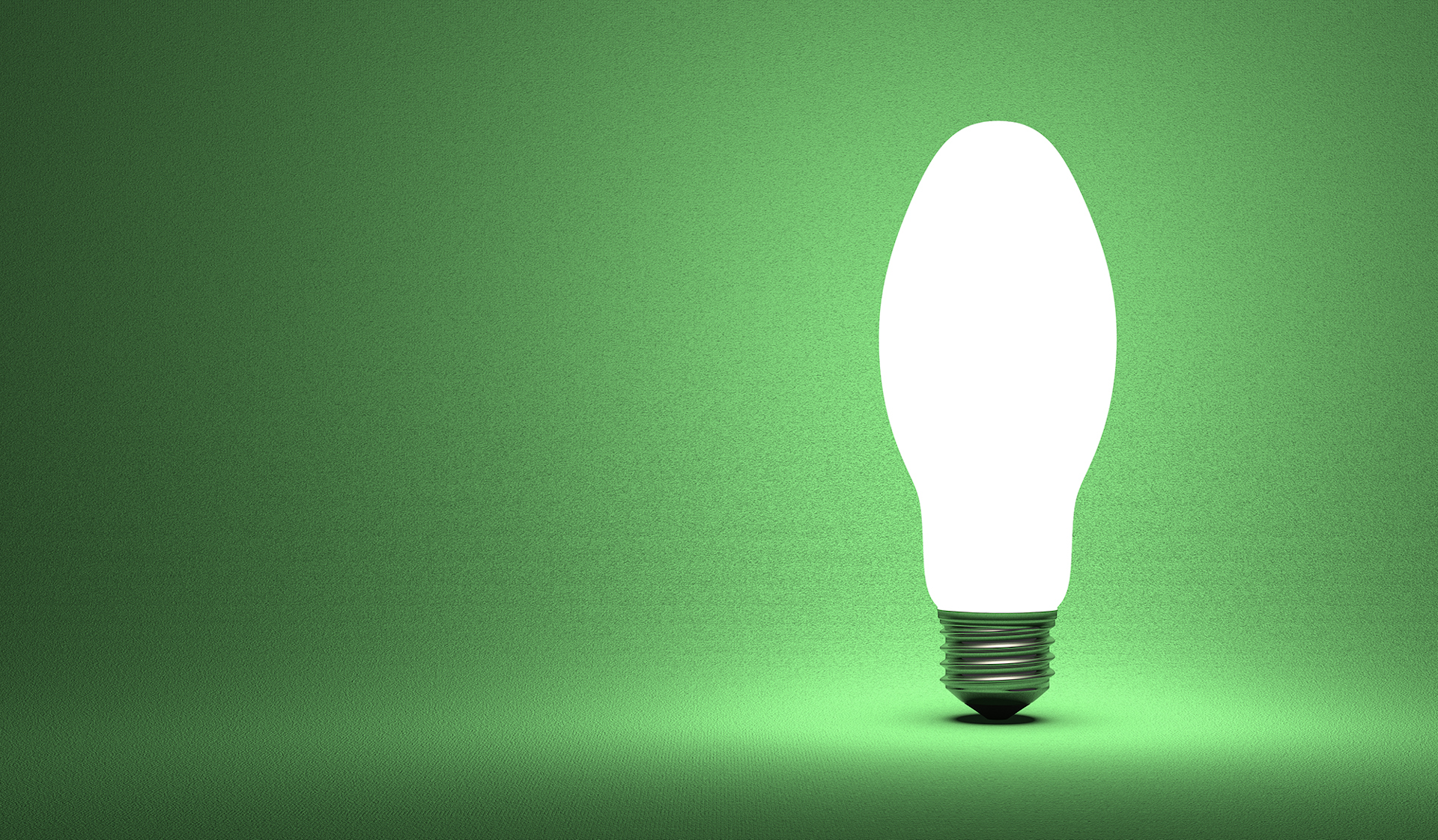 A lightbulb on a green background.