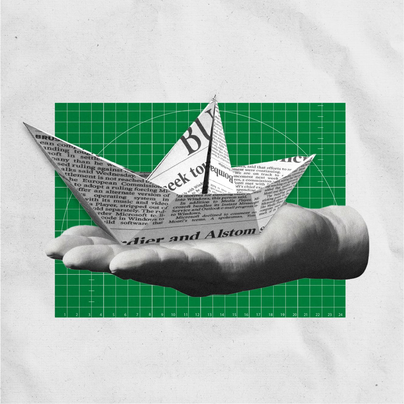A paper boat in the palm of a hand. 
