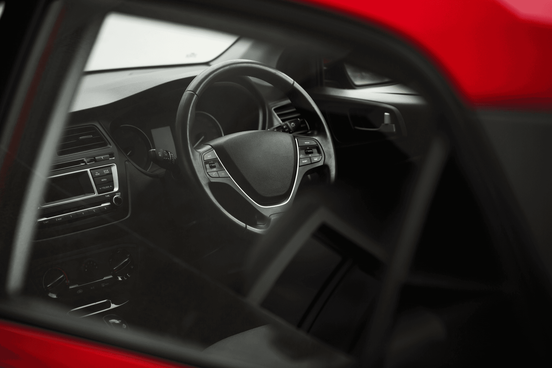 The inside of a car taken through the left door. The inside of a car taken through the left door.