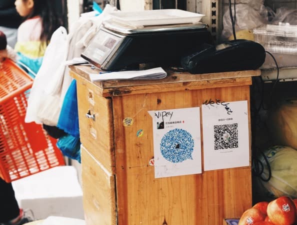 WeChat in use in a market WeChat in use in a market