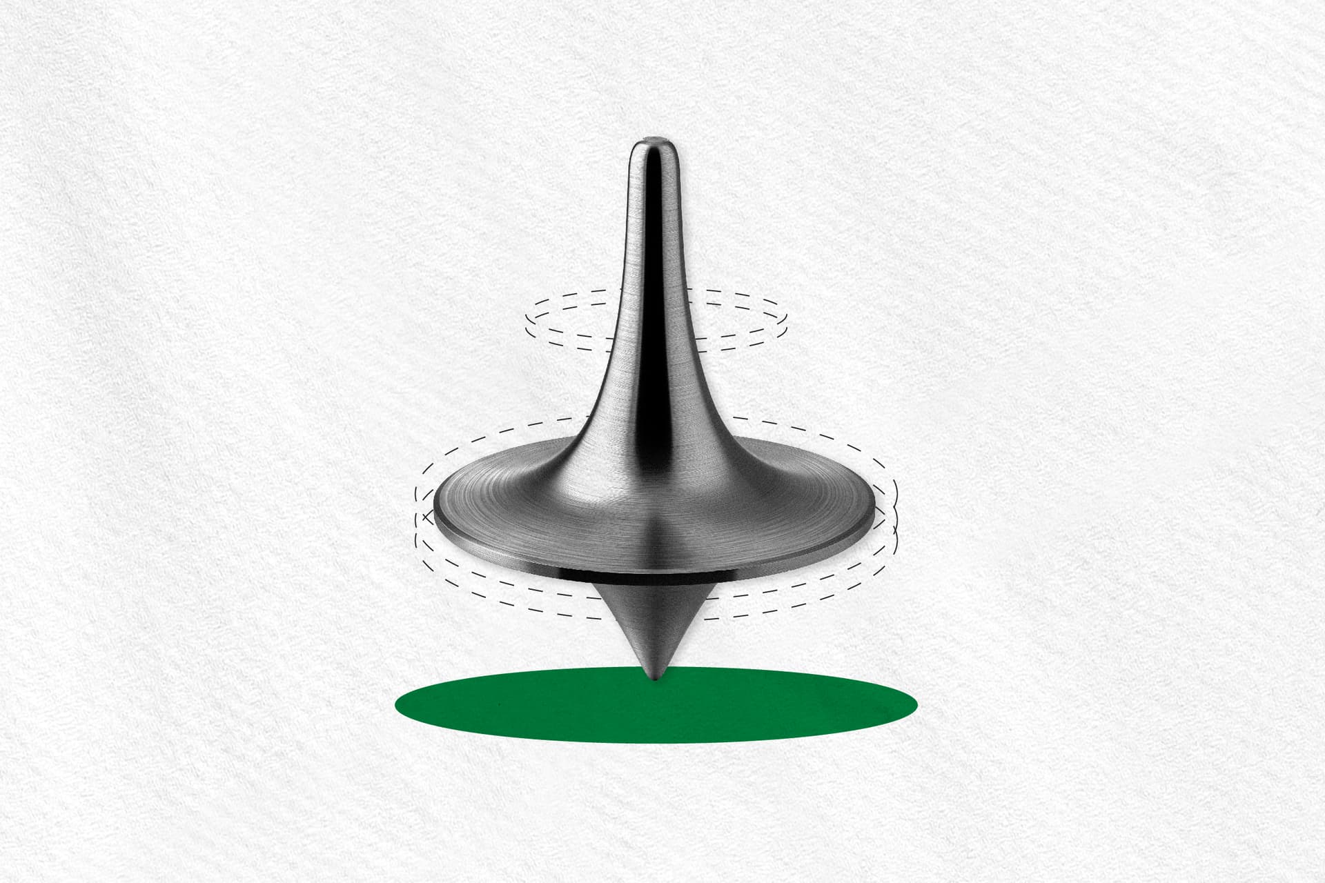 A metal spinning top turning A metal spinning top turning