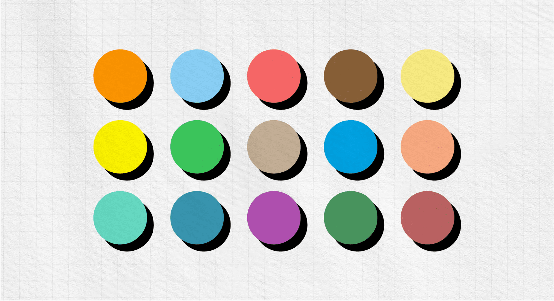 A wide range of colours is displayed in three rows of five columns, each dot has a drop shadow behind it. A wide range of colours is displayed in three rows of five columns, each dot has a drop shadow behind it.